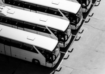 A line of charter buses