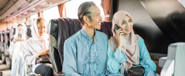 a couple aboard a church shuttle