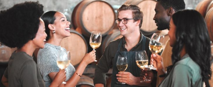 a group discussing a wine tour